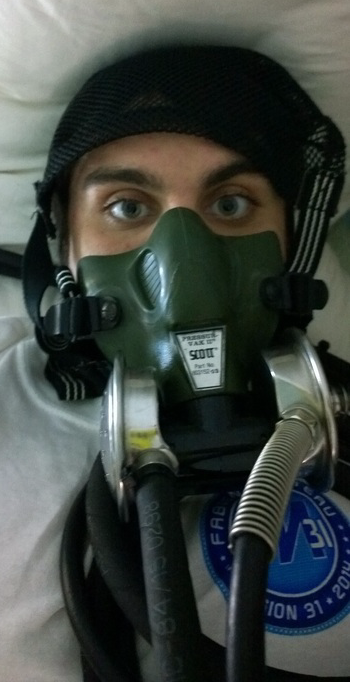 Adam Zenone wearing a mask